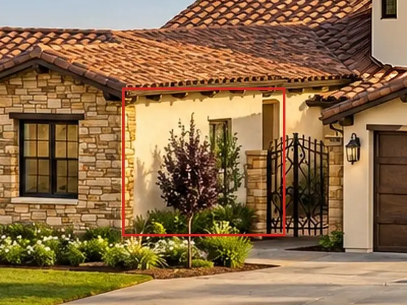 Front from the corner, as first drawn, the mistake boxed in red: Left of the iron gate, the stone gable's side wall was cream stucco with a small window and a tan recess.