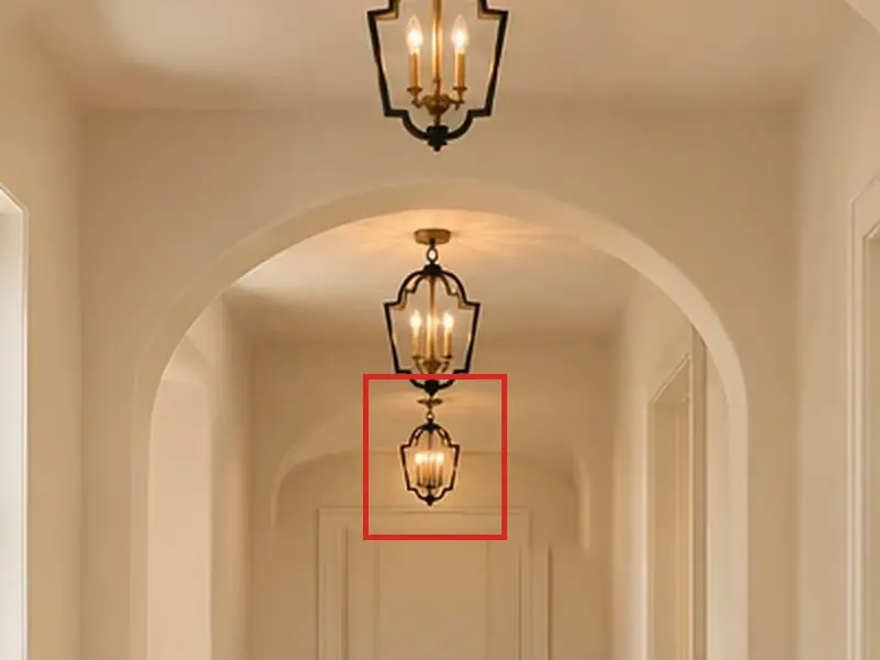 Hall, as first drawn, the mistake boxed in red: Two lanterns hung one right under the other, reading as one two-tier fixture.