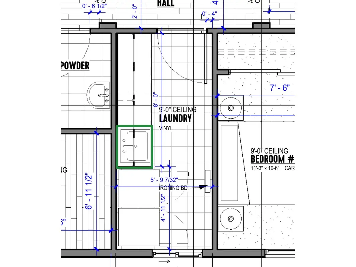 A2.1 · floor plan, boxed in green where it shows what belongs there: A2.1 sets the sink into the counter near its end, with the counter stopping where the washer and dryer begin.